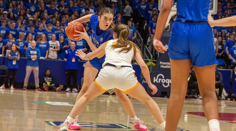 Springboro's Bryn Martin looks over the defense during last year's Division I state title game against Olmsted Falls at UD Arena. Jeff Gilbert/CONTRIBUTED