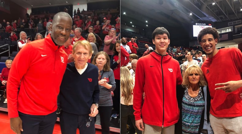 Dayton basketball fans Ron and Andrea Morton pose with Anthony Grant, left, and Mike Sharvajamts and Zimi Nwokeji, right. Submitted photos