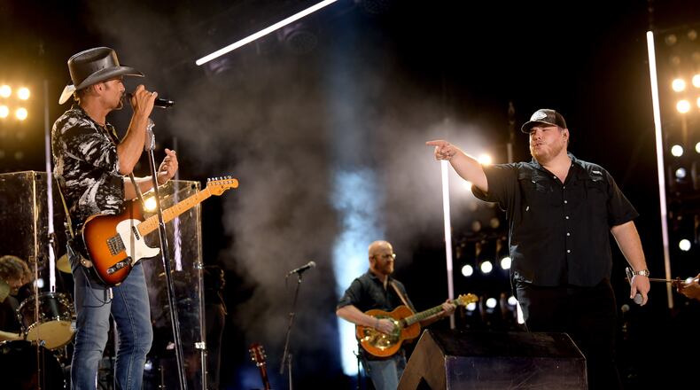 NASHVILLE, TENNESSEE - JUNE 08: (EDITORIAL USE ONLY) Tim McGraw and Luke Combs perform on stage during day 3 of the 2019 CMA Music Festival on June 08, 2019 in Nashville, Tennessee. (Photo by Jason Kempin/Getty Images)