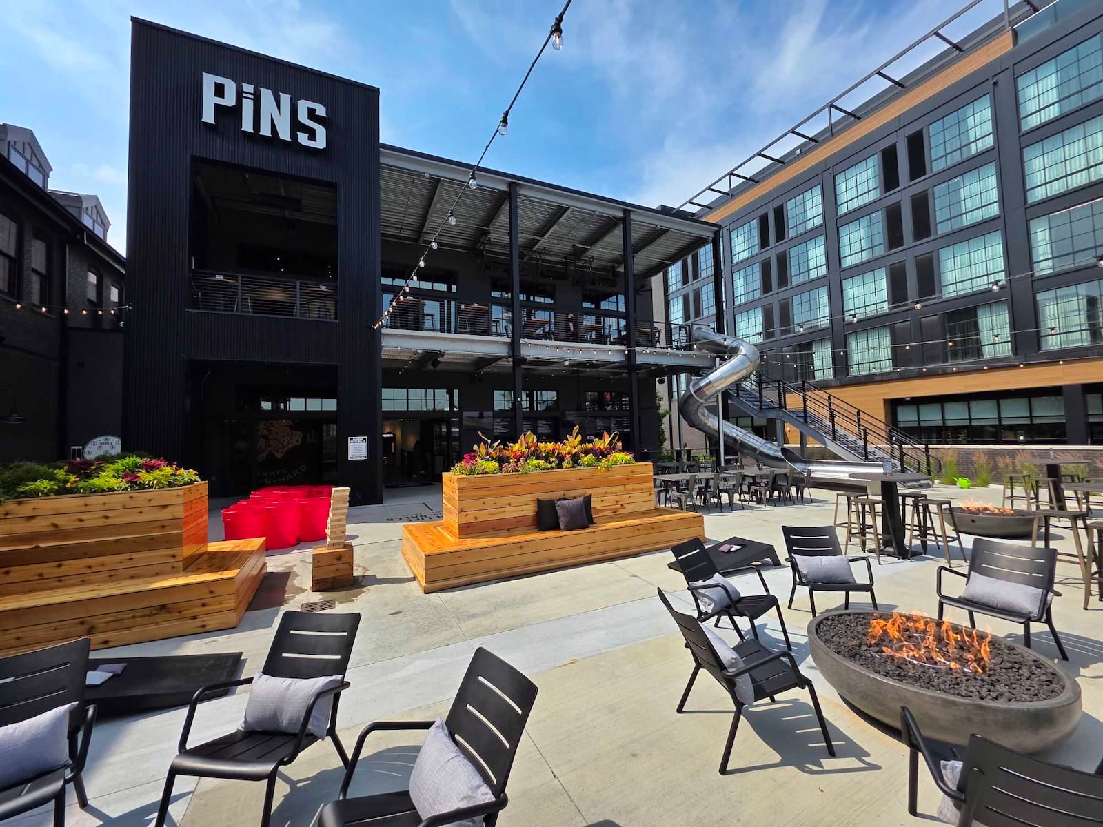 Pins Mechanical Co., located at 416 E. First St. in Dayton, is a social playground offering duckpin bowling, classic pinball machines, patio pong and more.  NICK GRAHAM/STAFF