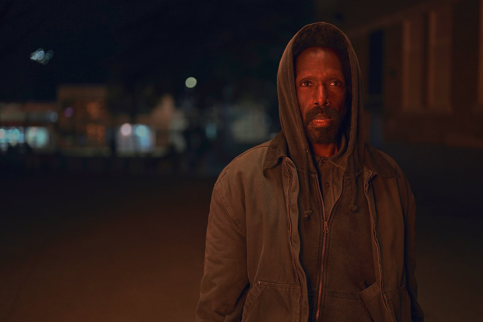This image released by Apple TV+ shows Ntare Guma Mbaho Mwine in a scene from "Smoke." (Apple TV+ via AP)