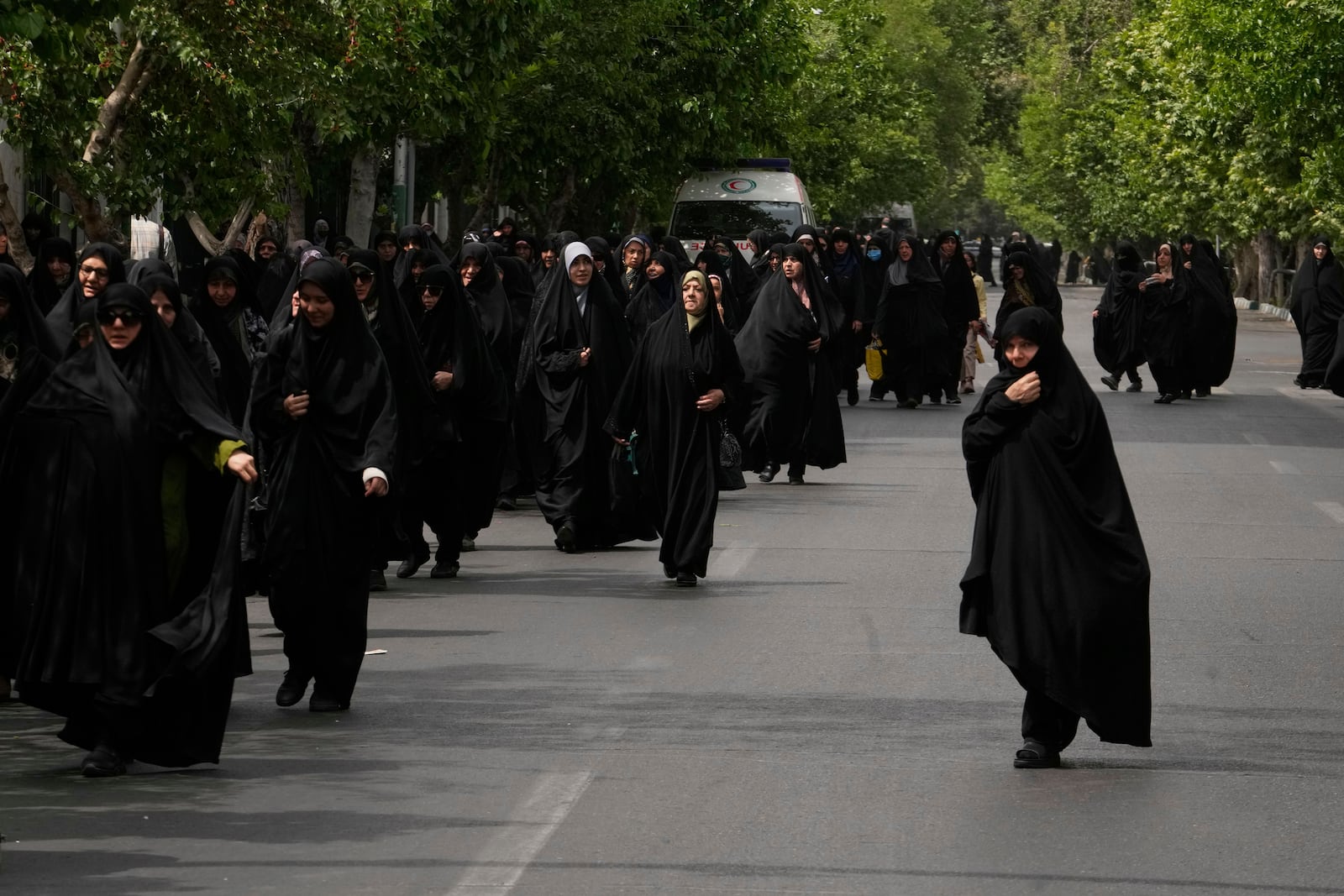 Worshippers leave after the conclusion of the Friday prayers, in Tehran, Iran, Friday, April 25, 2025. (AP Photo/Vahid Salemi)