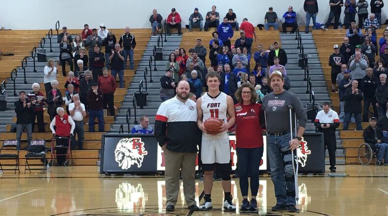 Boys basketball coach Corey Britton, Nick Brandewie, Stacey Brandewie, Jerry Brandewie. PHOTO COURTESY OF FORT LORAMIE ATHLETICS