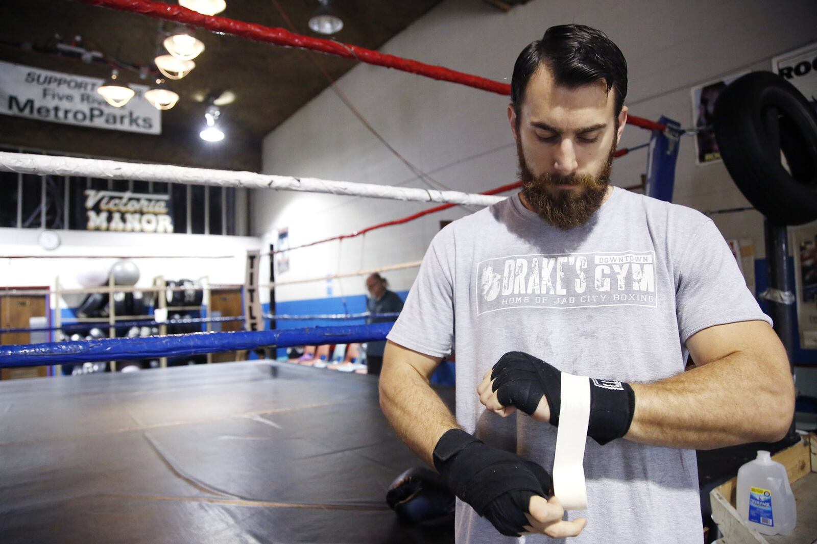 Warren Roberds, 29, headlines an MMA card in Akron on July 29. Roberds, who launched his professional career in Las Vegas, now trains in downtown Dayton at Drake’s Gym. TY GREENLEES / STAFF