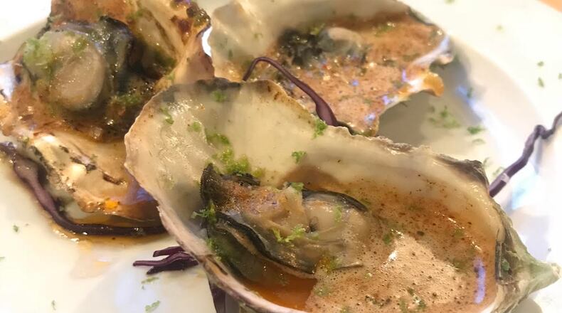 A baked oyster dish from Lily's Dayton. CONTRIBUTED