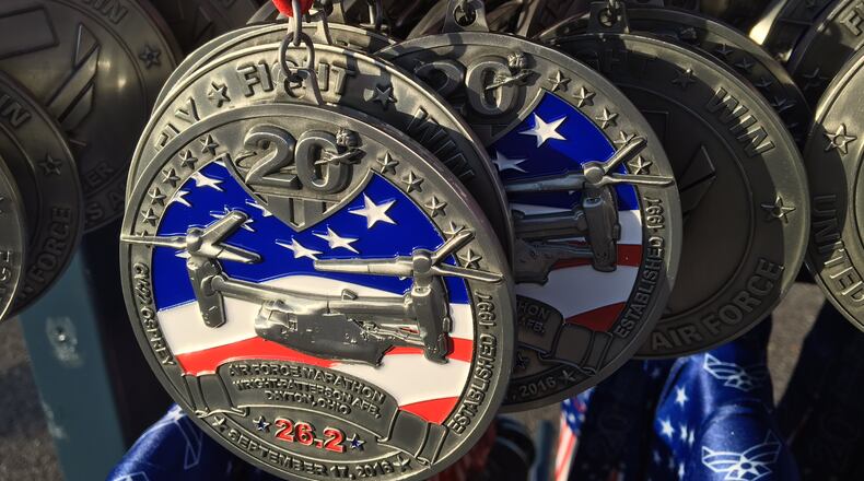 Runners medals stand ready at the finish line of the 20th anniversary of the Air Force Marathon. BARRIE BARBER/STAFF