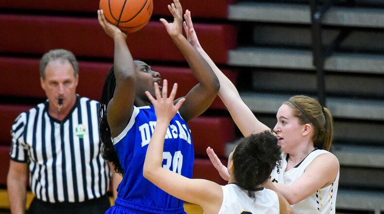 Dunbar’s Monet Allen puts up a shot during Division II sectional last season. NICK GRAHAM/STAFF