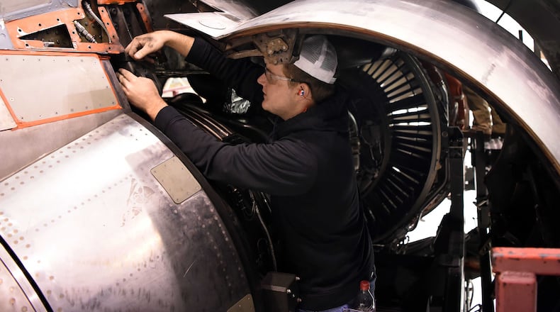 Jeffrey Smith, 562nd Aircraft Maintenance Squadron mechanic, performs engine change procedures on a C-17 Globemaster III aircraft Nov. 23, 2019, at Warner Robins Air Logistics Complex at Robins Air Force Base, Georgia. (U.S. Air Force photo by Tommie Horton)