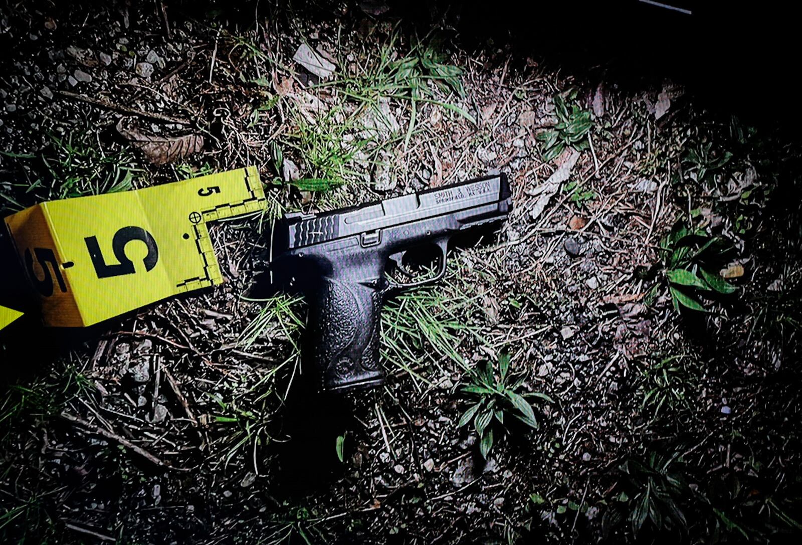 Dayton police found a gun at the scene of an officer-involved shooting. JIM NOELKER/STAFF