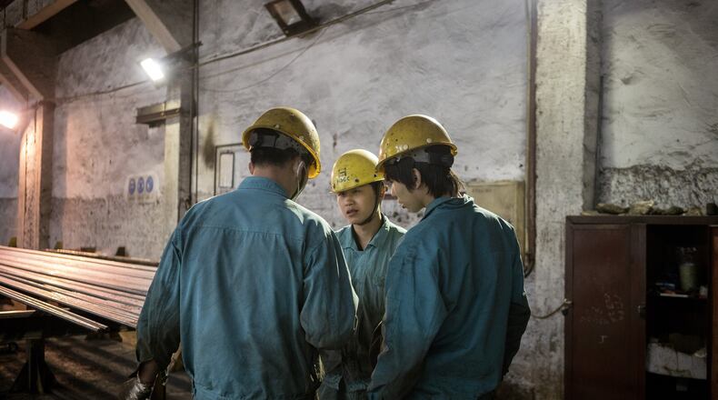 Workers at the Hangzhou Iron and Steel Group plant, a vast labyrinth of blast furnaces, warehouses, chimneys and worker dormitories covering hundreds of acres, in Hangzhou, China, April 11, 2017. China’s vast steel industry is a major target of President Donald Trump’s move to rethink American trade, but taming China’s mills can be expensive and difficult. (Giulia Marchi/The New York Times)