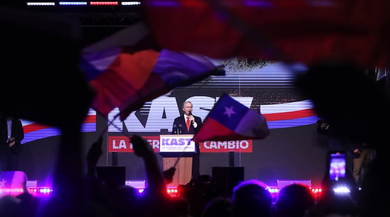 Presidential candidate Jose Antonio Kast of the Republican Party, addresses supporters after early results in the general elections in Santiago, Chile, Sunday, Nov. 16, 2025. (AP Photo/Cristobal Escobar)