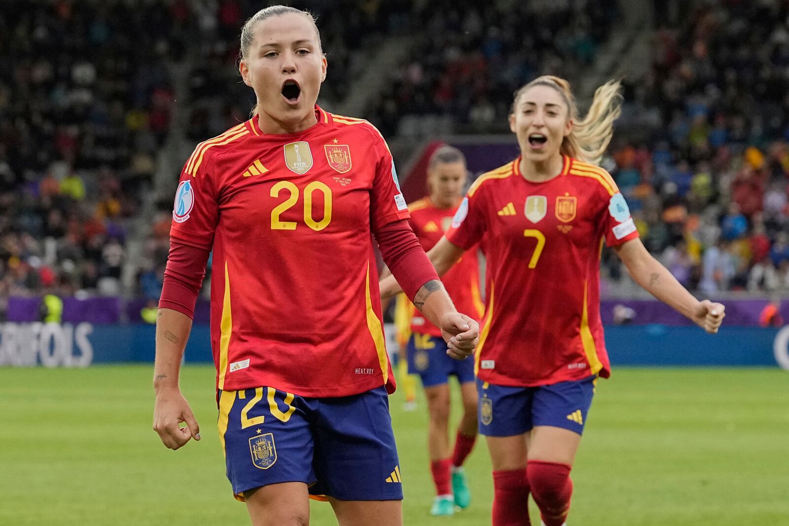 Spain's Claudia Pina celebrates after scoring her side's fifth goal during the Euro 2025, group B, soccer match between Spain and Belgium at Arena Thun in Thun, Switzerland, Monday, July 7, 2025. (AP Photo/Martin Meissner)