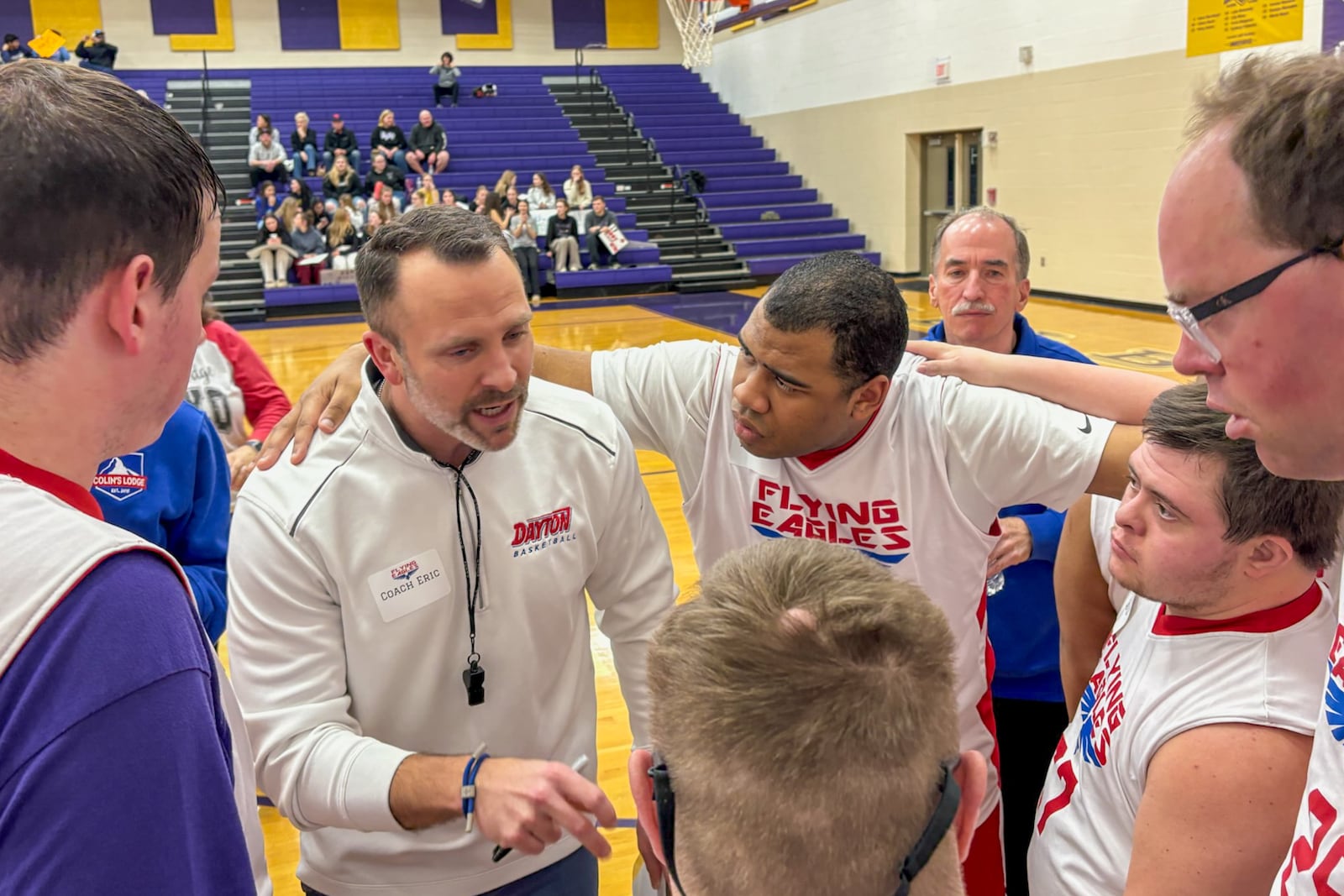 Coach Eric Farrell gives the Flying Eagles some final instructions:  “Remember, we’re here to have fun. We are here to compete. And we share the ball. We’re a team, right?” TOM ARCHDEACON / CONTRIBUTED PHOTO
