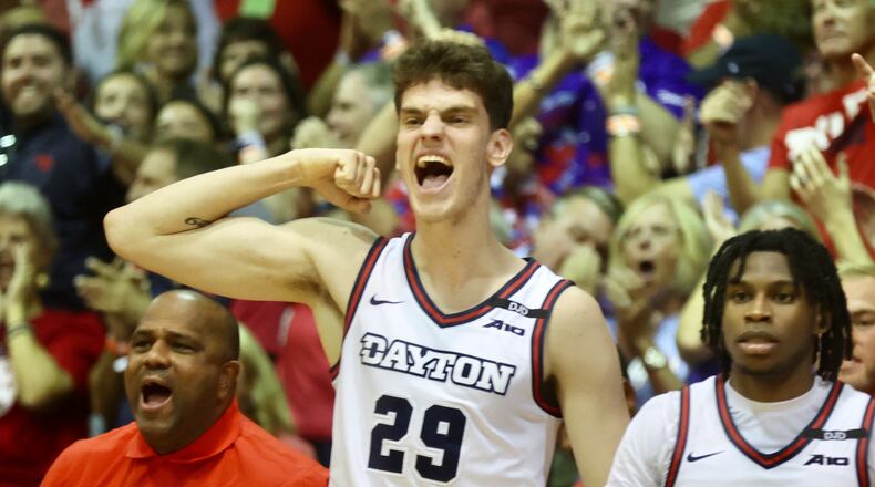 Dayton's Amaël L'Etang celebrates after a basket against Connecticut in the Maui Invitational on Wednesday, Nov. 27, 2024, at the Lahaina Civic Center. David Jablonski/Staff