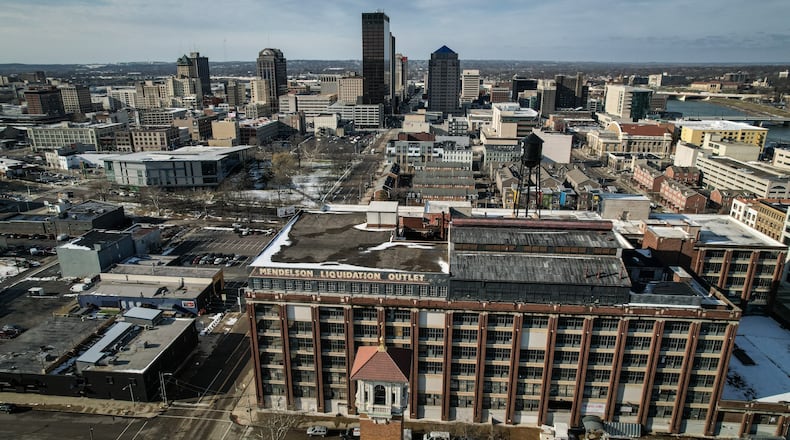 Trustees of the Dayton-Montgomery County Port Authority voted Tuesday to financially support the construction of a 480-spot parking garage as part of the redevelopment of the Mendelson’s building in downtown Dayton. JIM NOELKER/STAFF