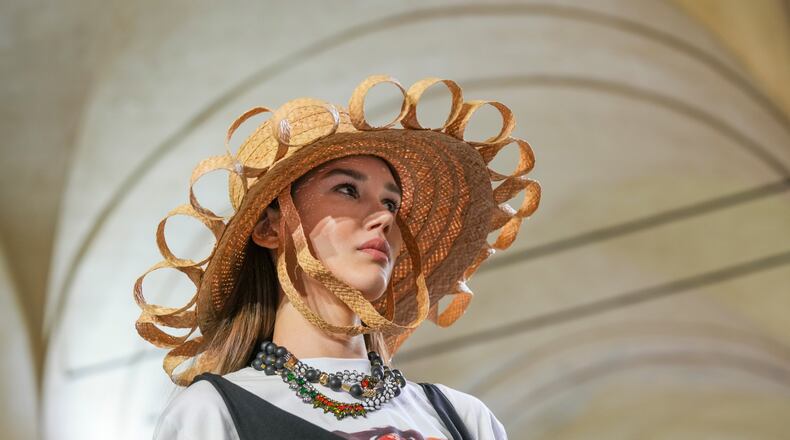 A model wears a creation as part of the Stella Jean's Spring/Summer 2026 collection presented in Milan, Italy, Saturday, Sept. 27, 2025. (AP Photo/Antonio Calanni)