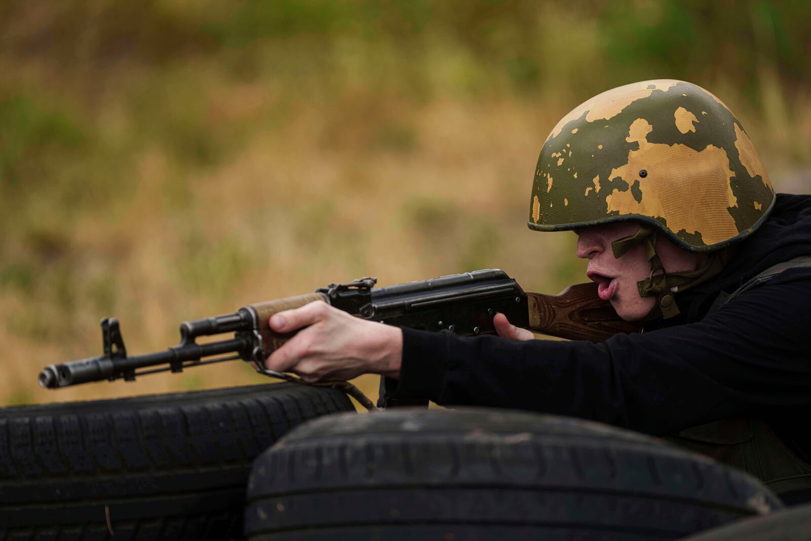 A Ukrainian 3rd Assault Brigade recruit trains at the polygon in Kyiv region, Ukraine, on Wednesday, July 16, 2025. (AP Photo/Evgeniy Maloletka)