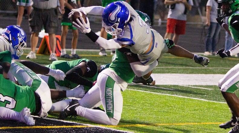 Miamisburg's Connor Smith scores on a six-yard run in the second quarter Thursday night that gave the Vikings a 15-12 lead. Jeff Gilbert/CONTRIBUTED