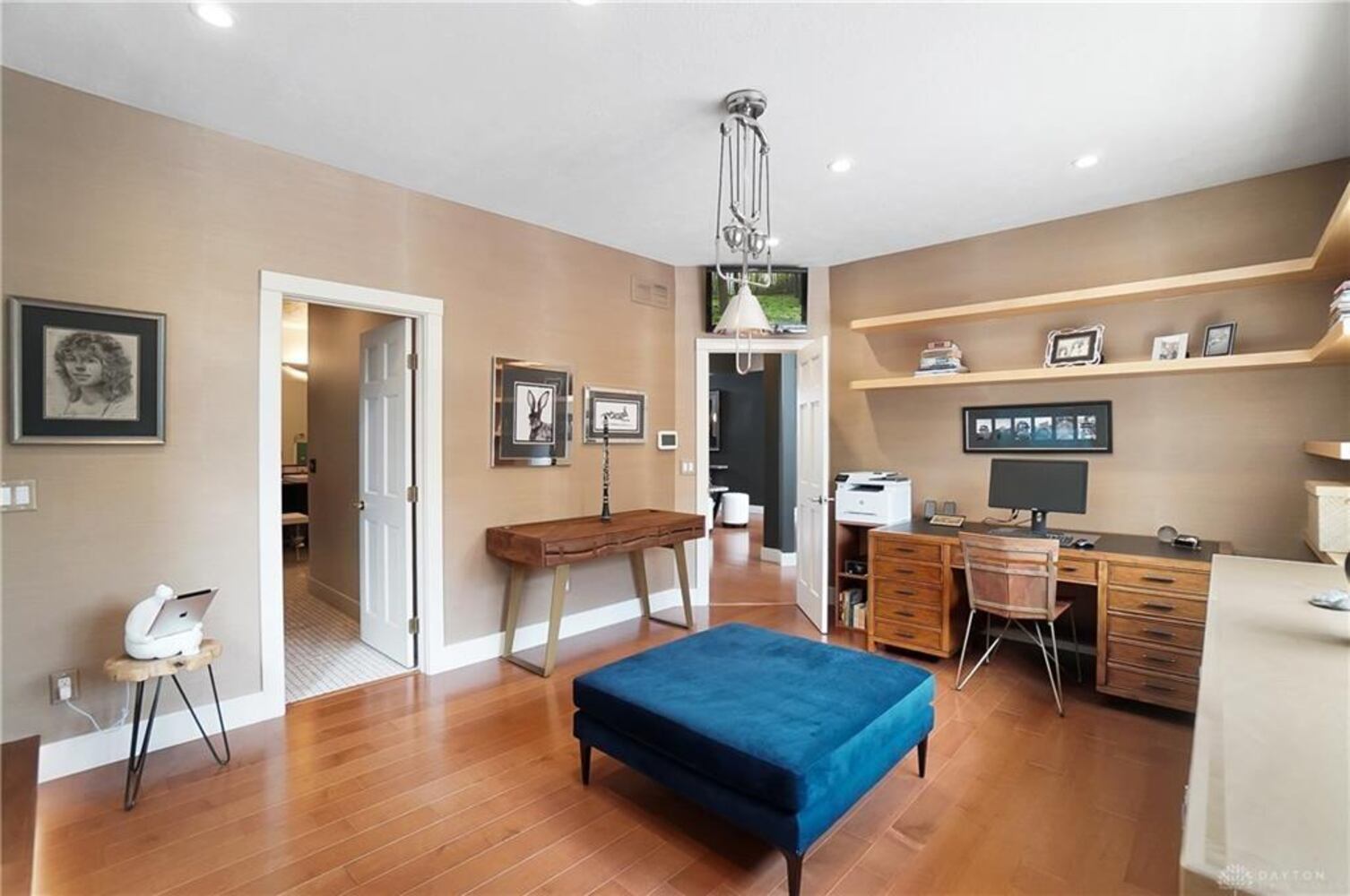 PHOTOS: Spectacular $1.8M luxury home on market with pool, golf simulator