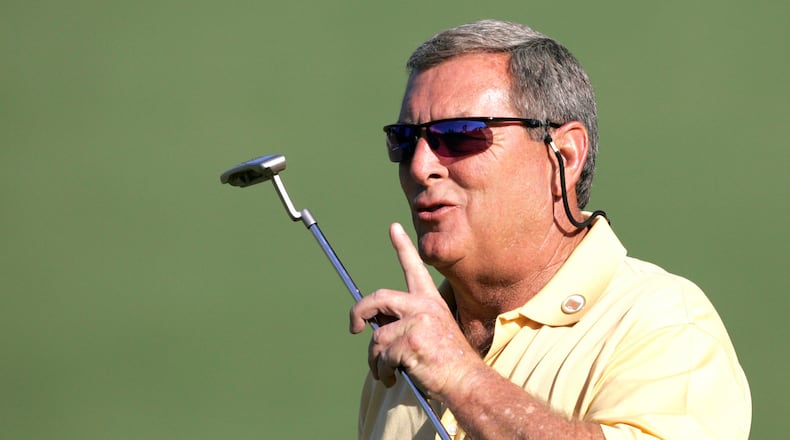 FILE - In this April 6, 2006, file photo, Fuzzy Zoeller encourages the crowd to be quiet on the second hole during first round play at the Masters golf tournament at the Augusta National Golf Club in Augusta, Ga. (AP Photo/Morry Gash, File)