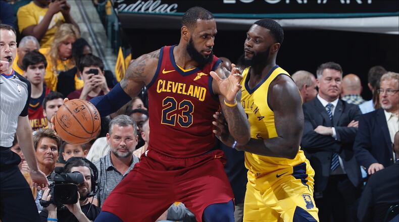 INDIANAPOLIS, IN - APRIL 20: LeBron James #23 of the Cleveland Cavaliers looks to the basket against Lance Stephenson #1 of the Indiana Pacers in the first half of game three of the NBA Playoffs at Bankers Life Fieldhouse on April 20, 2018 in Indianapolis, Indiana. NOTE TO USER: User expressly acknowledges and agrees that, by downloading and or using the photograph, User is consenting to the terms and conditions of the Getty Images License Agreement. (Photo by Joe Robbins/Getty Images)