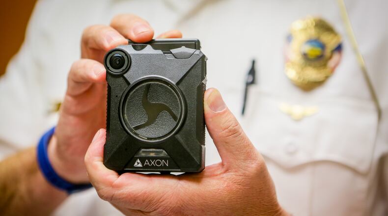 University of Dayton police officers have begun reviewing footage from body cameras every week at random.