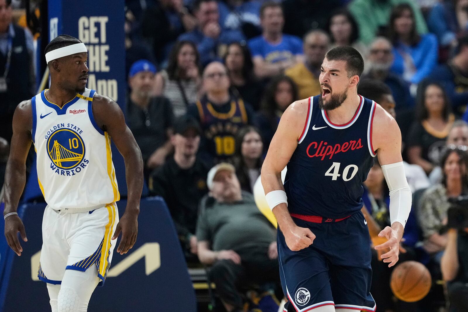 Los Angeles Clippers center Ivica Zubac (40) reacts after scoring against the Golden State Warriors during the first half of an NBA basketball game Sunday, April 13, 2025, in San Francisco. (AP Photo/Godofredo A. Vásquez)