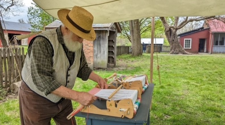 MetroParks volunteer Steve McNew works the loom at Carriage Hill MetroPark. He’s put in more than 800 hours as a historic interpreter since he started volunteering in 2019. CONTRIBUTED