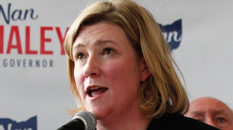 Dayton Mayor Nan Whaley, a Democrat, announces she is running for Ohio governor in front of a crowd of supporters at Warped Wing Brewery Monday, May 8, 2017. CHRIS STEWART / STAFF