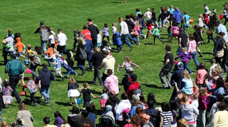 Young's Jersey Dairy held their 30th annual Easter Egg Hunt Sunday. Hundreds of children and their parents dashed across the Dairy's driving range trying to collect their share of the 5,400 hard boiled and dyed Easter Eggs during the annual tradition.