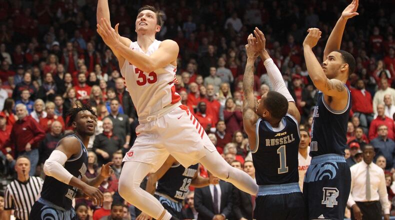 Daytons Ryan Mikesell scores in overtime against Rhode Island on Friday, March 1, 2019, at UD Arena. David Jablonski/Staff