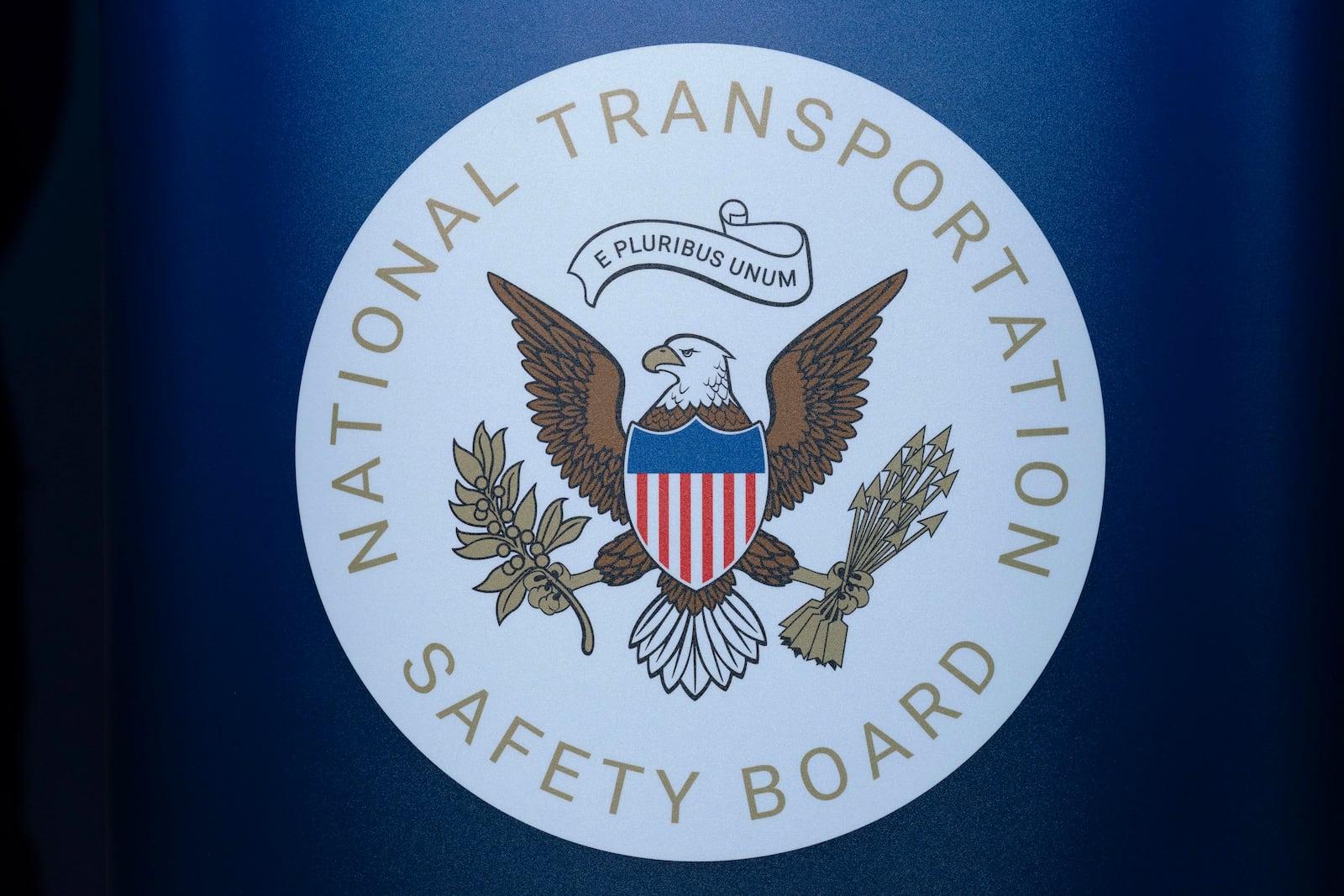 FILE - The seal of the National Transportation Safety Board is seen before a news conference at Ronald Reagan Washington National Airport, Jan. 31, 2025, in Arlington, Va. (AP Photo/Jose Luis Magana, File)