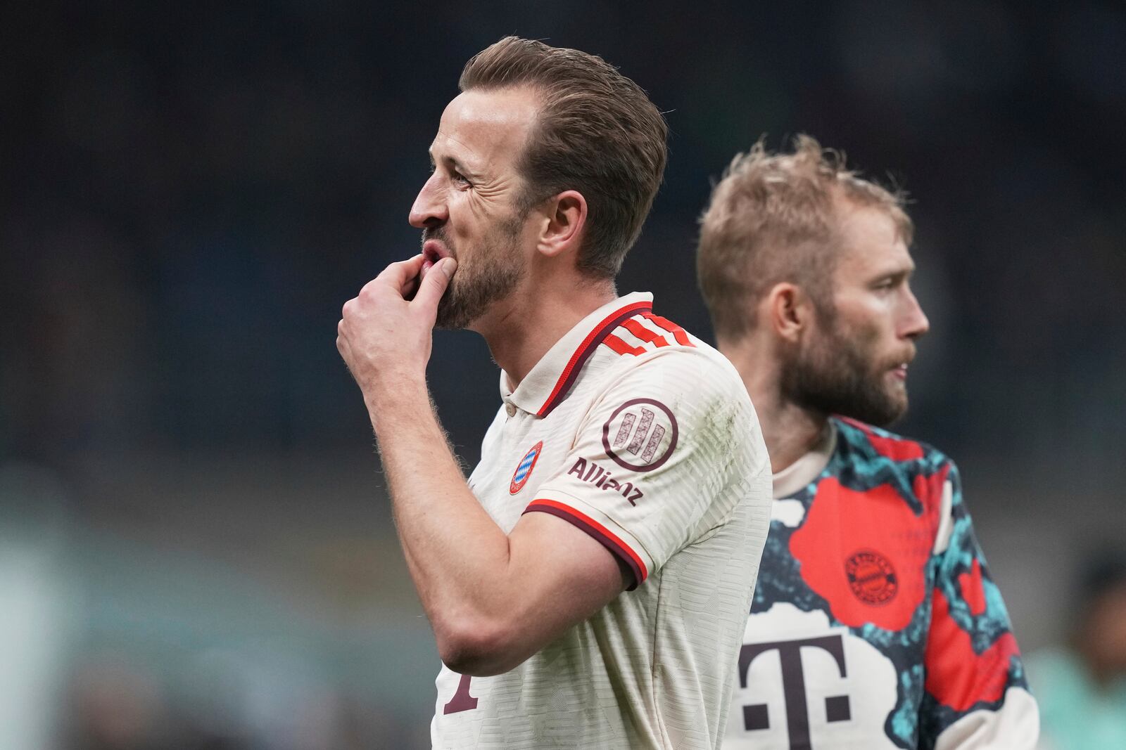 Bayern's Harry Kane reacts at the end of the Champions League quarterfinal second leg soccer match between Inter Milan and Bayern Munich at the San Siro stadium in Milan, Italy, Wednesday, April 16, 2025. (AP Photo/Antonio Calanni)