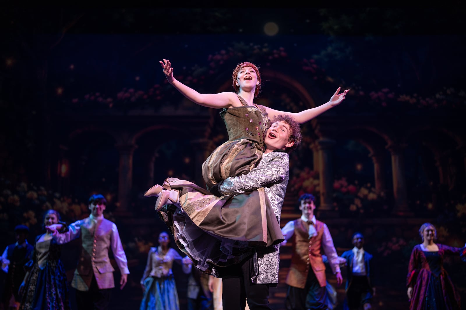 Tabitha Powell (Anna) and Griffin Greear (Hans) sing "Love Is An Open Door" in Muse Machine's production of Disney's "Frozen." Photo by Matt Silver