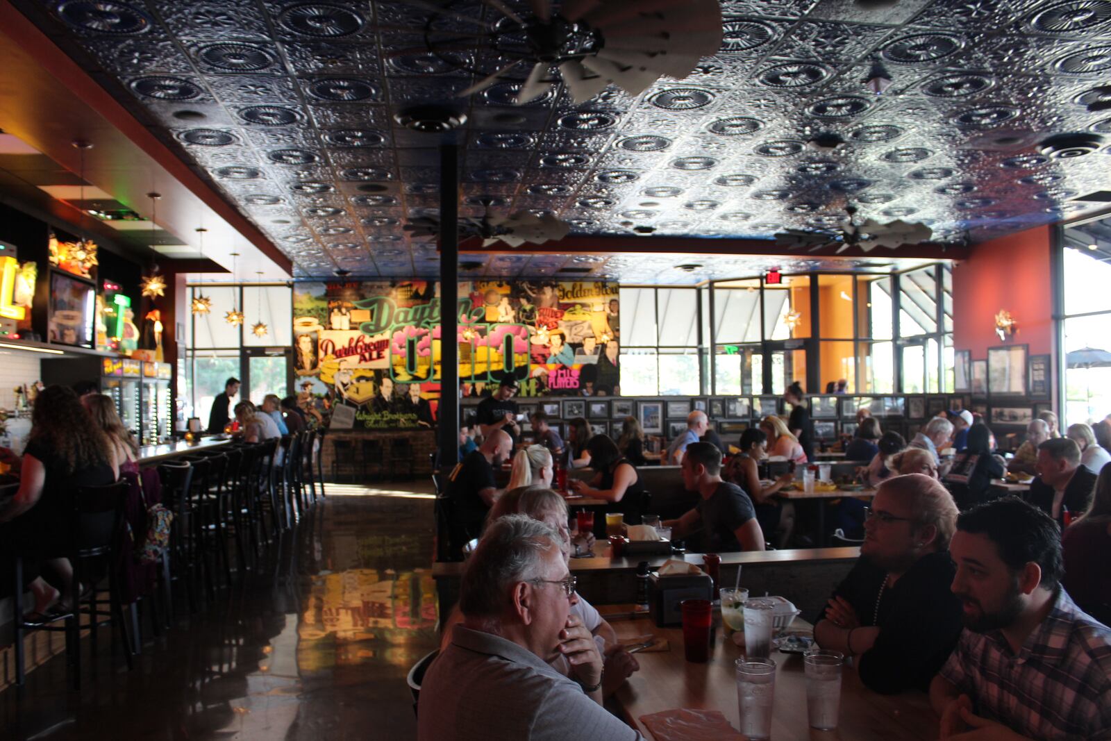 Melt Bar and Grilled opened its first Dayton area restaurant in Beavercreek on June 12, 2017.  Sneak peeks were held the weekend before. The restaurant employees 100 and is decorated in Dayton decor. Matt Fish is Melt's founder.