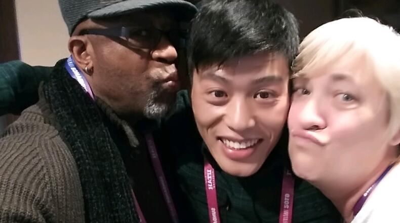 Robert "Bobby" Allen, Wong He and Jill Lamantia pose for a selfie.  The trio appears in Julia Reichert and Steven Bognar's "American Factory" and are featured on a poster for it.