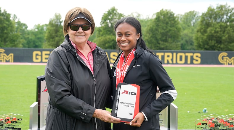 Dayton's Jadyn Haywood, right, poses with A-10 Commissioner Bernadette V. McGlade after winning the A-10 Performer of the Year Award in 2025 at George Mason Stadium in Fairfax, Va. Photo courtesy of UD