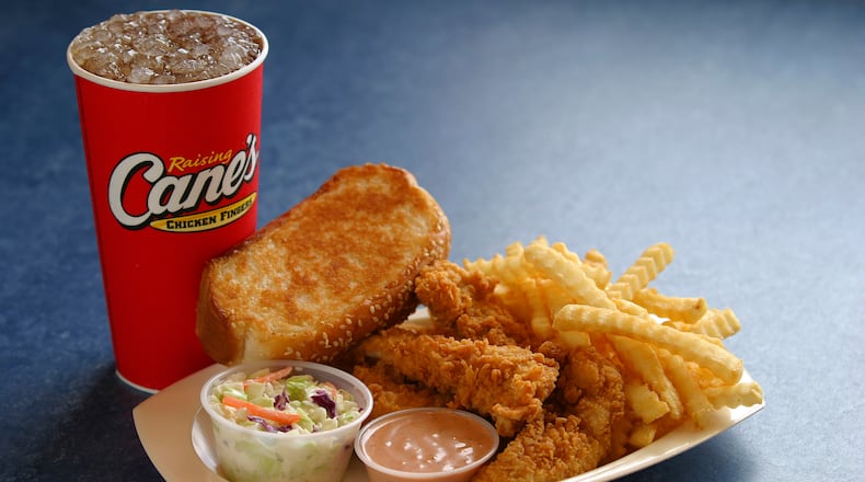 Raising Cane’s menu includes chicken fingers, crinkle-cut fries, cole slaw, Texas Toast and Cane’s Sauce. CONTRIBUTED