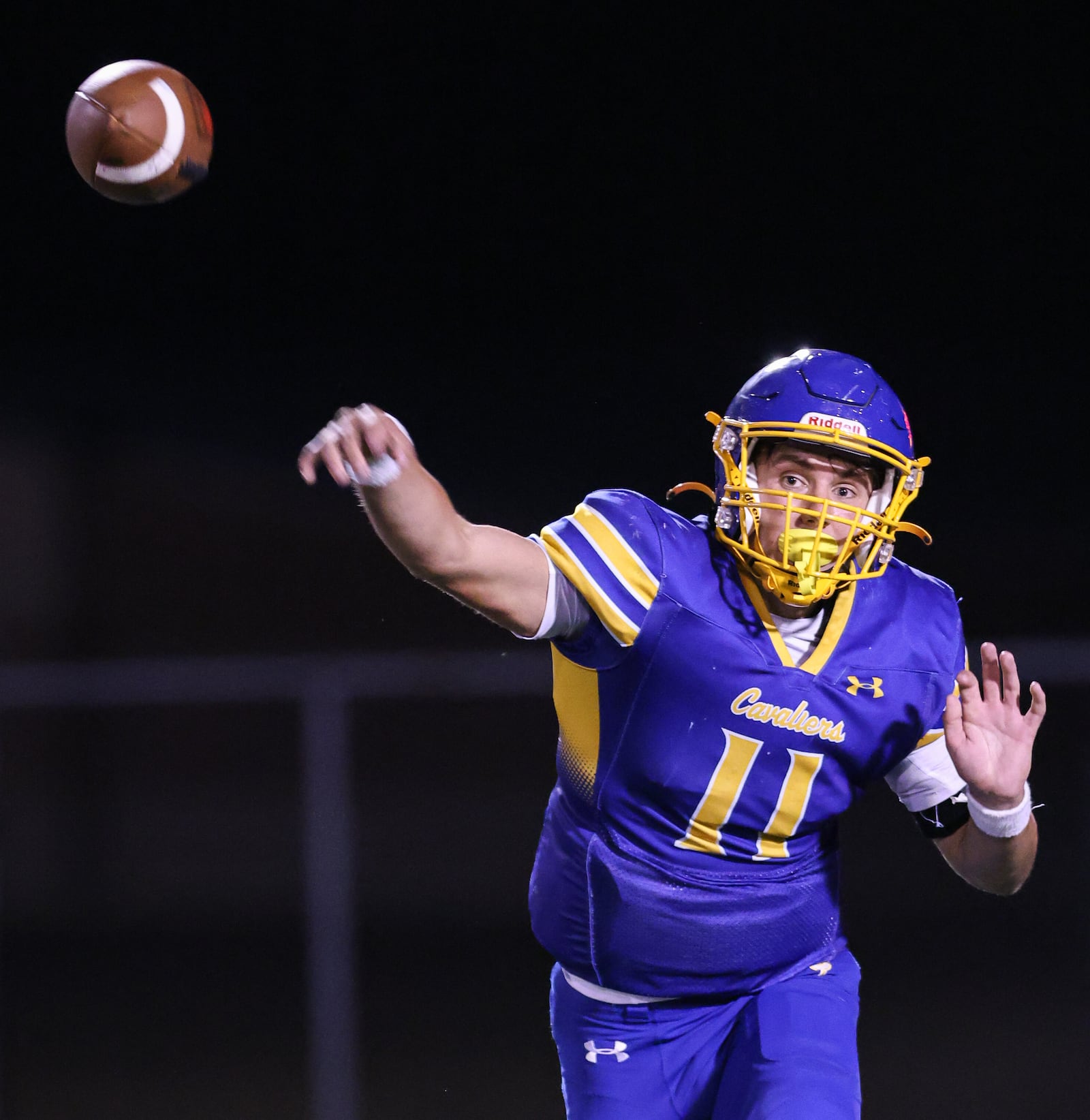 Lehman Catholic senior quarterback Turner Lachey throws during a Three Rivers Conference game against Northridge on Thursday, Sept. 11 at Sidney Memorial Stadium. BRYANT BILLING / STAFF