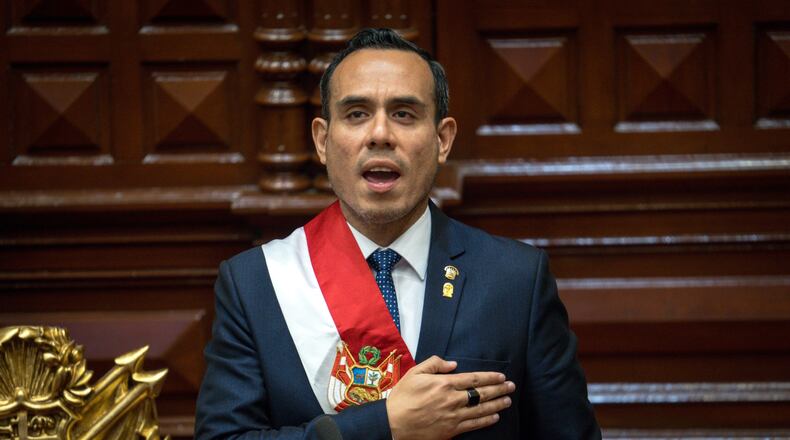 Peru's former president of the Congress Jose Jeri, sings the national anthem after being sworn-in as the interim president in Lima, Peru, Friday, Oct. 10, 2025. (AP Photo/John Reyes)