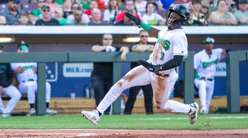 Dayton's Jay Allen II scores a run earlier this season at Day Air Ballpark. Jeff Gilbert/CONTRIBUTED