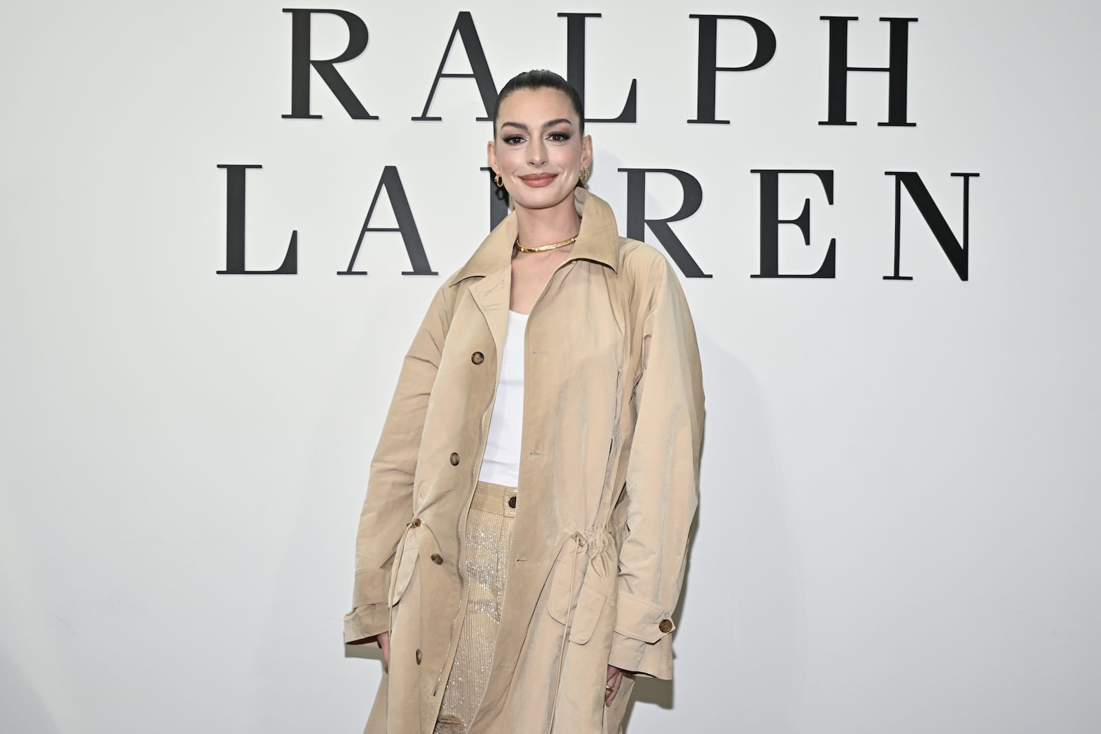 Anne Hathaway arrives at the Ralph Lauren Fall 2025 presentation on Thursday, April 17, 2025, in New York. (Photo by Evan Agostini/Invision/AP)