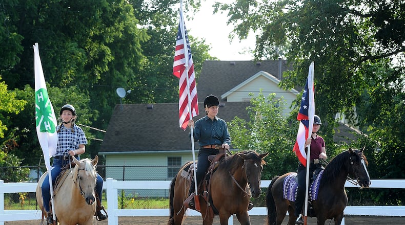 The presentation of the colors takes place before the horse show at the Greene County Fair on Tuesday, Aug. 1, 2023. MARSHALL GORBY\STAFF