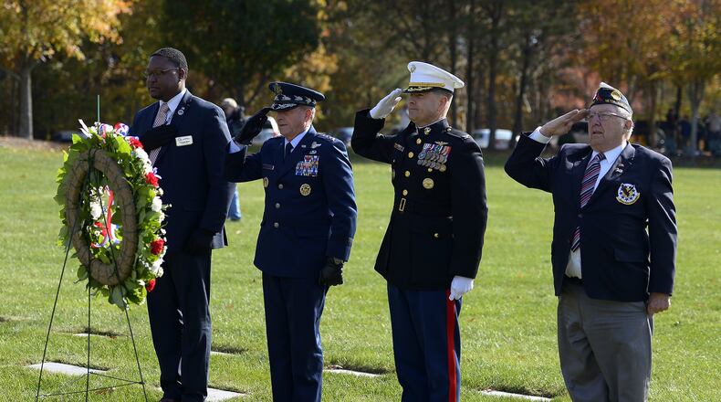 Air Force Chief of Staff Gen. David L. Goldfein salutes after placing a wreath during a Veterans Day ceremony at Quantico National Cemetery in Quantico, Va., Nov. 11, 2017. The Veterans Day ceremony is an annual event hosted by the Potomac Region Veterans Council. The event featured a performance by the Quantico Marine Corps Band. (U.S. Air Force photo by Tech. Sgt. Dan DeCook)