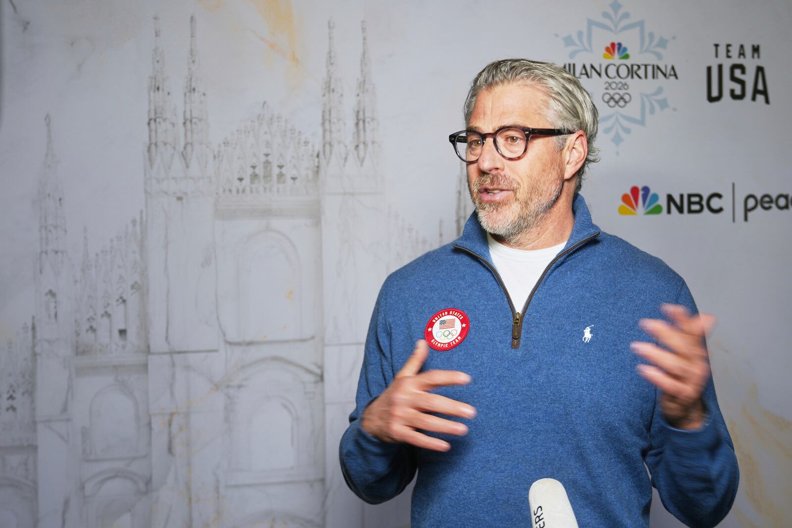 Casey Wasserman, Chairman of LA 2028, the organizing committee for the 2028 Summer Olympics and Paralympics, is interviewed at an NBCUniversal and U.S. Olympic & Paralympic Committee press preview event to promote the upcoming Milano Cortina 2026 Olympic and Paralympic Winter Games, in Los Angeles on Wednesday, May 21, 2025. (AP Photo/Damian Dovarganes)