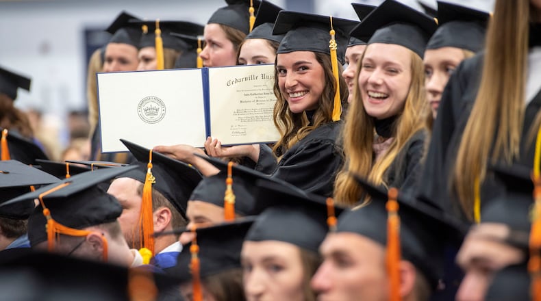 The largest graduating class in Cedarville University history celebrated the start of a new chapter in their lives during the 126th commencement Saturday, May 7, 2022, in the Doden Field House. Cedarville awarded 924 graduates, 774 of which were undergraduate students and 150 graduate students. Cedarville held two commencement ceremonies--at 10 am and 2 pm. The morning ceremony granted degrees to undergraduate and graduate students from the schools of allied health, business, education, engineering and computer science, and nursing. Graduate degrees were also awarded to individuals in nursing and the MBA program. The afternoon ceremony honored undergraduate and graduate students from the departments of art, design, and theatre; communication; English, literature, and modern languages; history and government; interdisciplinary studies; music and worship; psychology; science and mathematics, social work, and the schools of biblical and theological studies and pharmacy. Graduate students were also presented with degrees from the school of biblical and theological studies and the doctoral pharmacy program. PHOTOS COURTESY OF CEDARVILLE UNIVERSITY