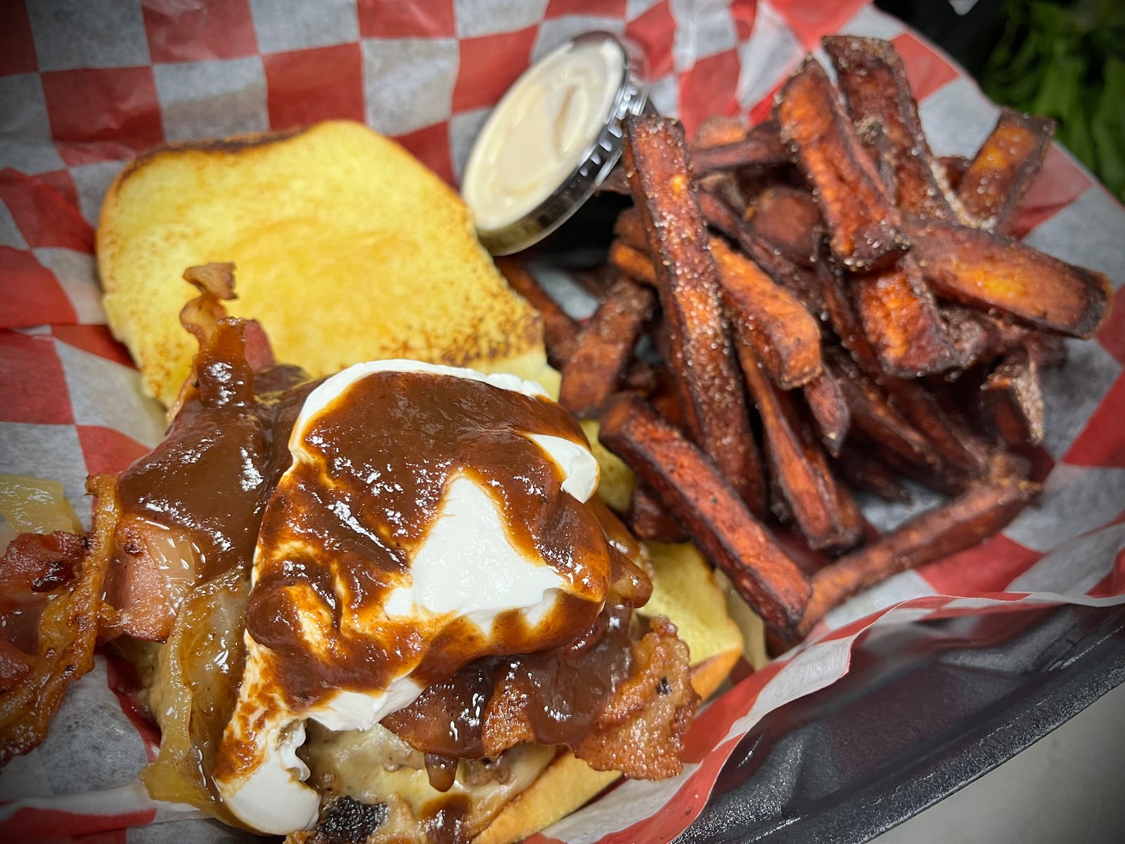 Roots Burgers & Fries is one of six vendors inside The Social at Piqua Center. NATALIE JONES/STAFF