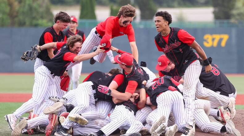 Lakota West players celebrate after defeating Cincinnati Moeller 3-2 in a Division I regional final on Wednesday at Wright State University's Nischwitz Stadium. The win earned the program its first state berth since 2017. BRYANT BILLING / STAFF