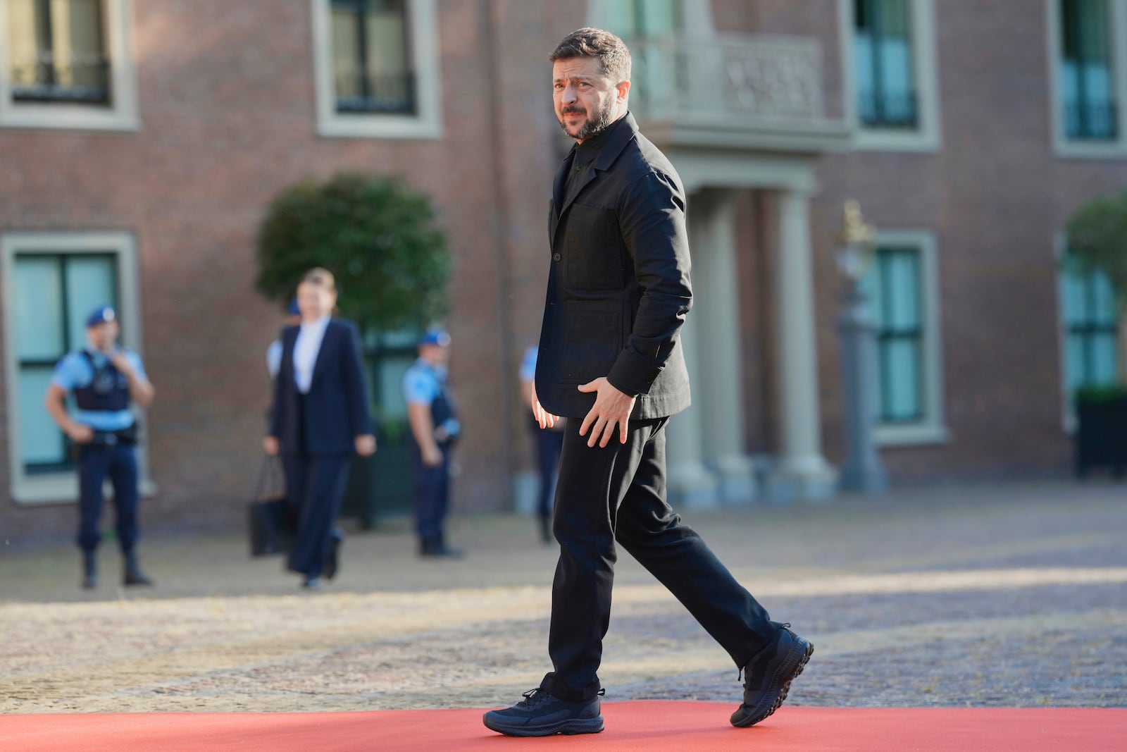 Ukraine's President Volodymyr Zelenskyy arrives ahead of a formal dinner at the Paleis Huis ten Bosch ahead of the NATO summit in The Hague, Netherlands, Tuesday, June 24, 2025. (AP Photo/Markus Schreiber)