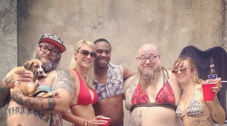 The Tumbleweed Connection 454 E. Fifth St. in Dayton's Oregon District will hold its fifth annual Critter & Car Wash for Charity on Aug. 20, 2017.
Binki clad men and women wash cars to benefit Adopt-a-Pit and Summit for Soldiers.